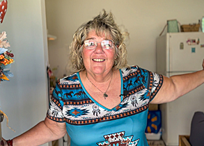 Woman standing in a doorway